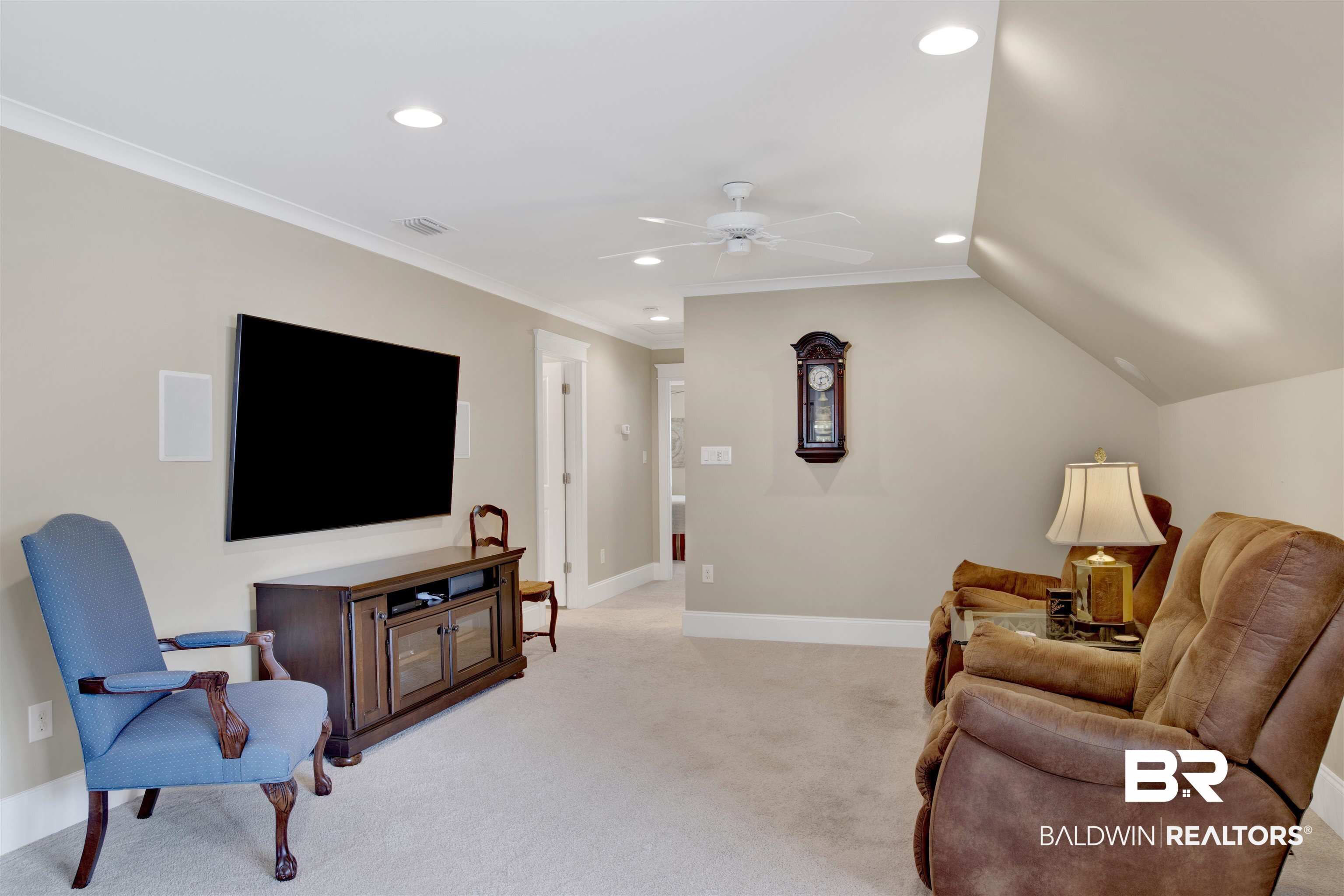 131 Sedgefield Avenue Fairhope, AL 36532 - Photo 36 of 50 Upstairs bonus room with ornamental molding, carpet flooring, ceiling fan, and vaulted ceiling