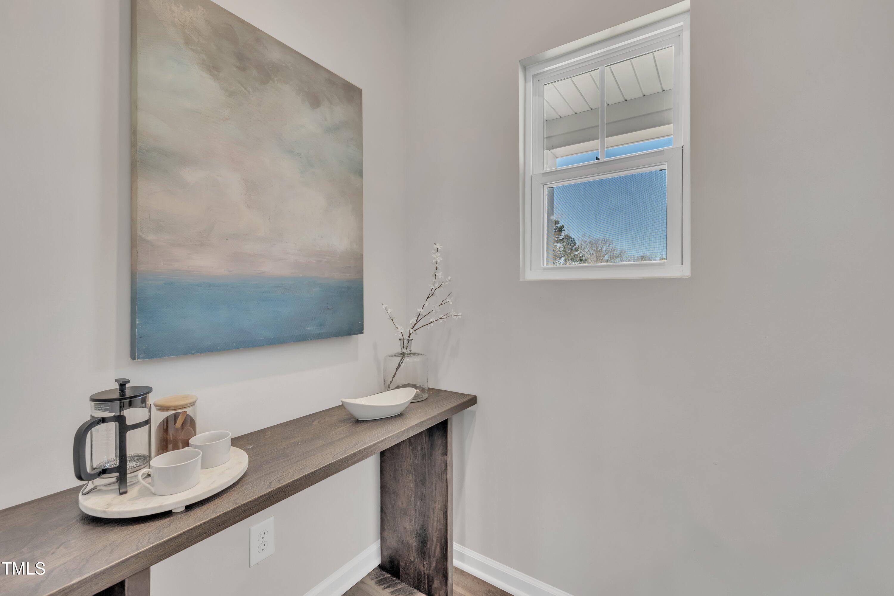 3381 Lovage Drive Apex, NC 27502 - Photo 17 of 50 a bathroom with a sink and a mirror