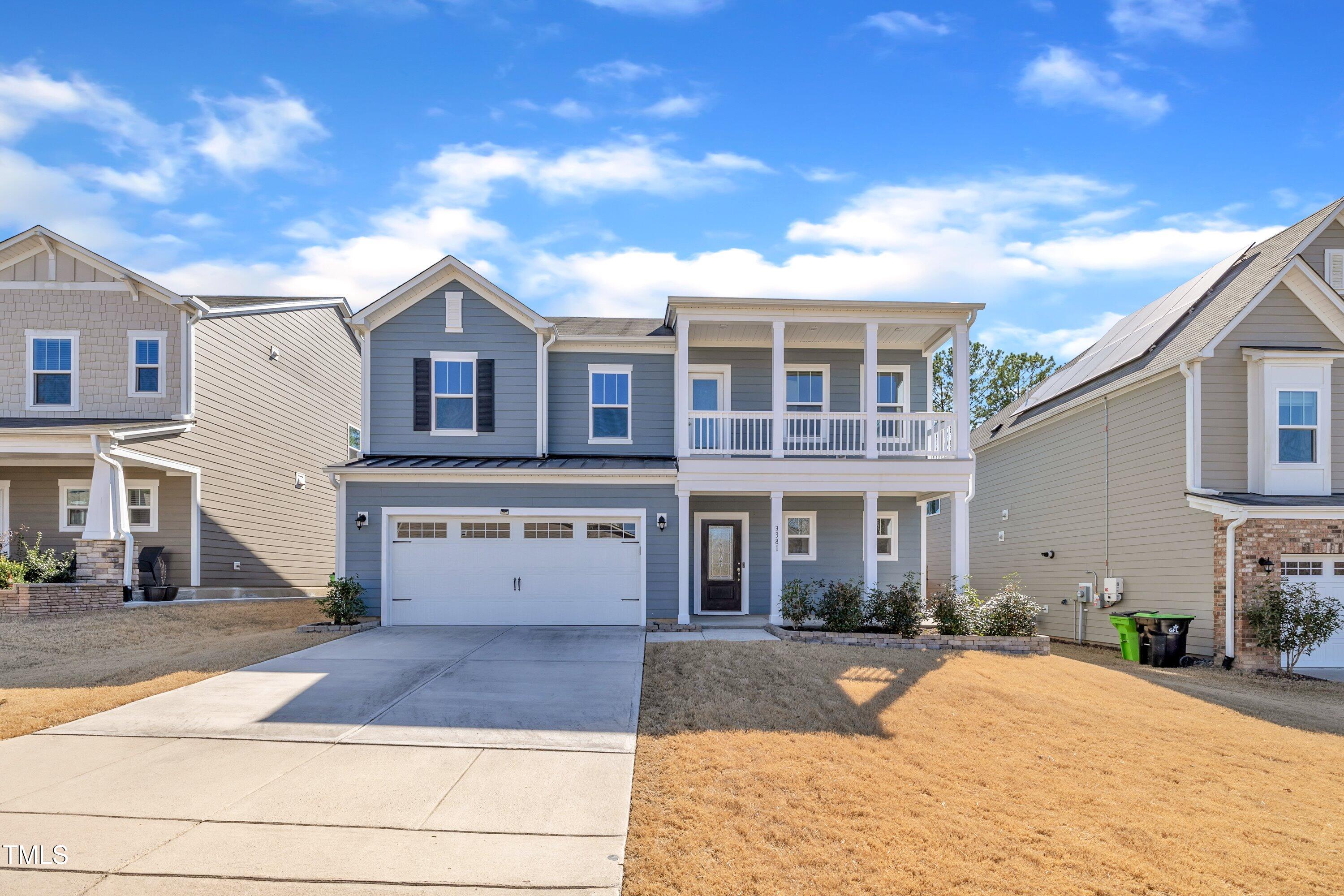 3381 Lovage Drive Apex, NC 27502 - Photo 2 of 50 a front view of a house with a yard