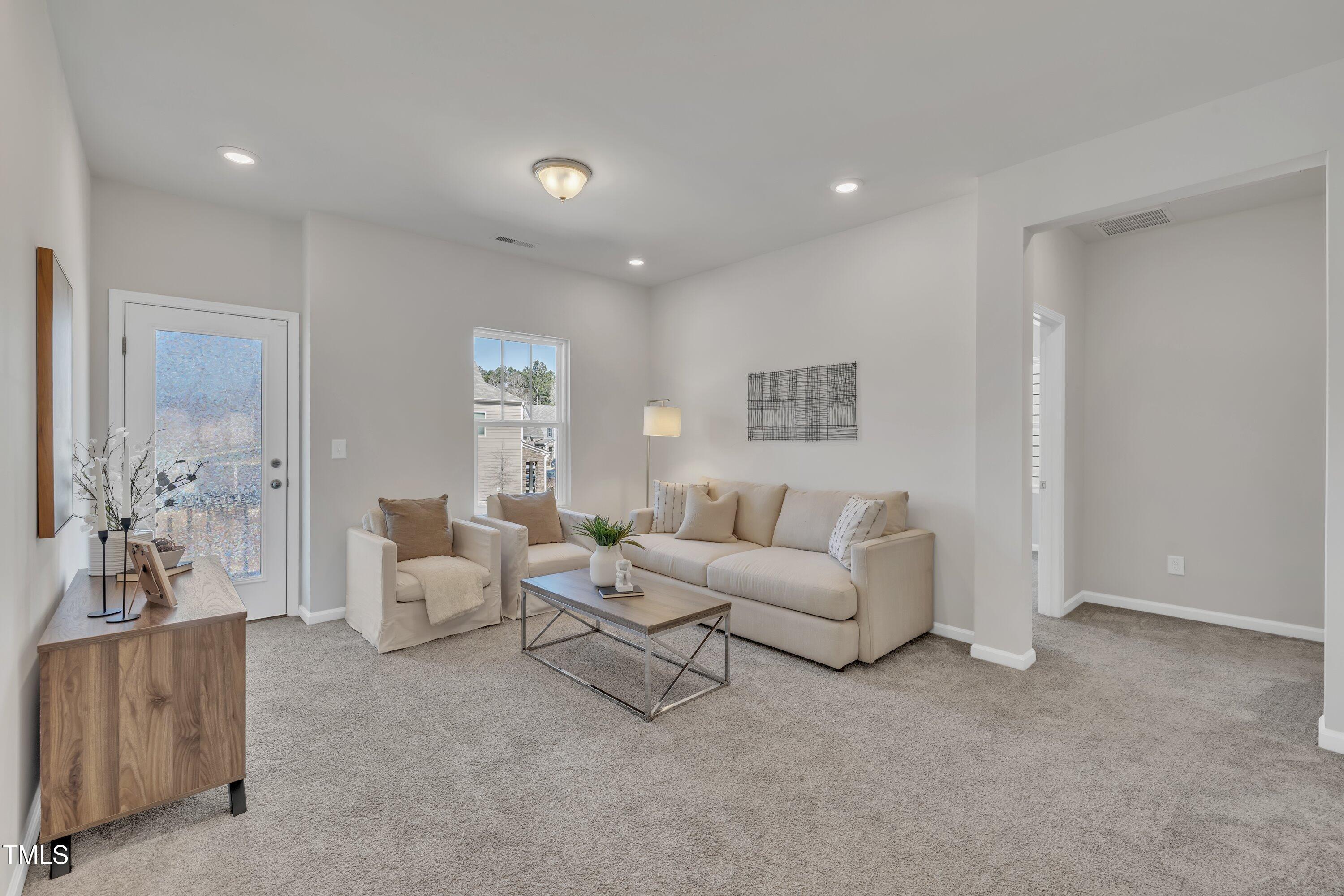 3381 Lovage Drive Apex, NC 27502 - Photo 29 of 50 a living room with furniture