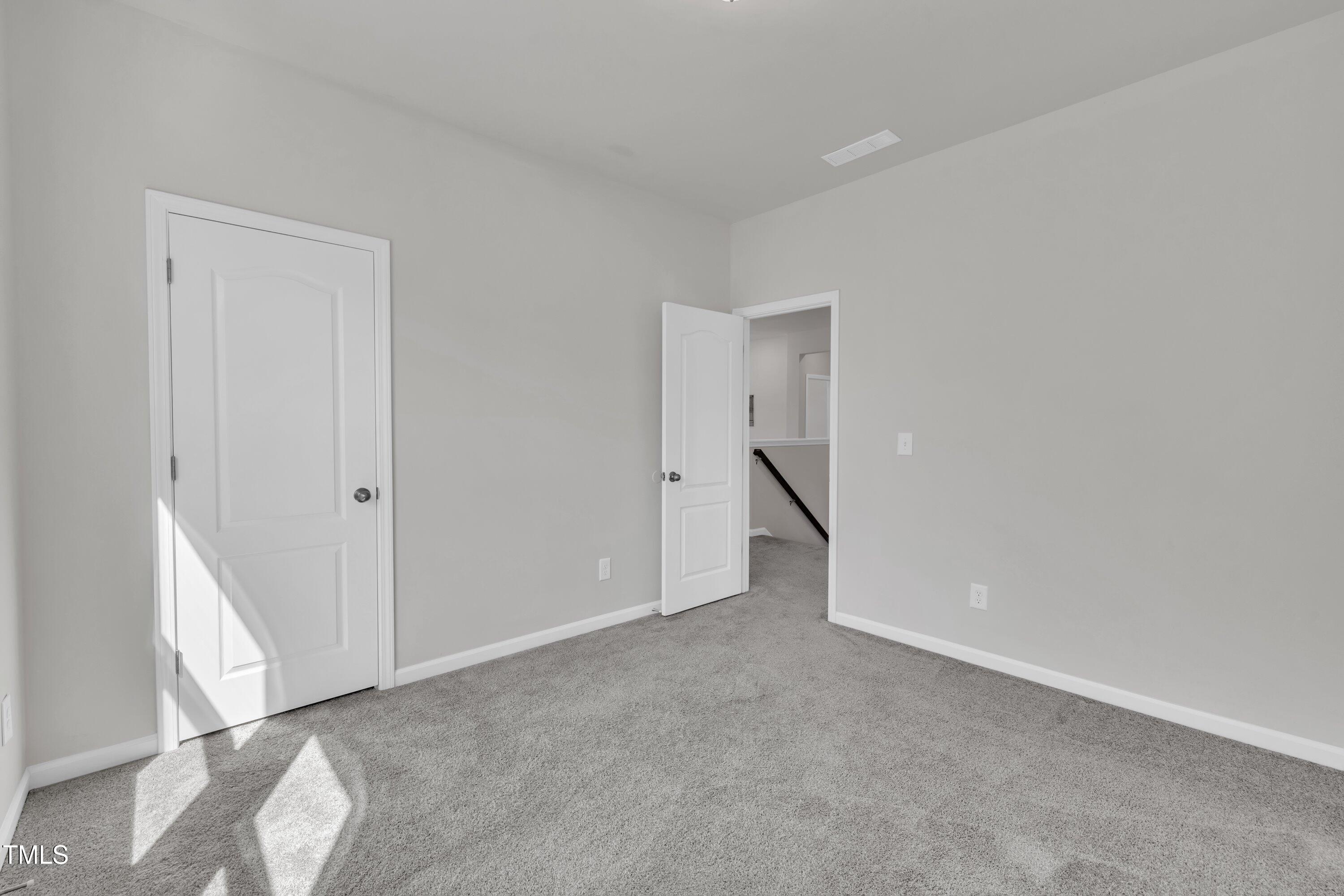 3381 Lovage Drive Apex, NC 27502 - Photo 39 of 50 a view of an empty room
