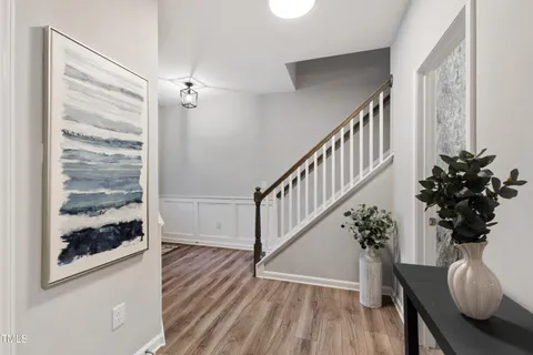 a view of entryway with wooden floor