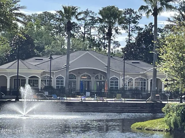 a view of a garden with a sitting area