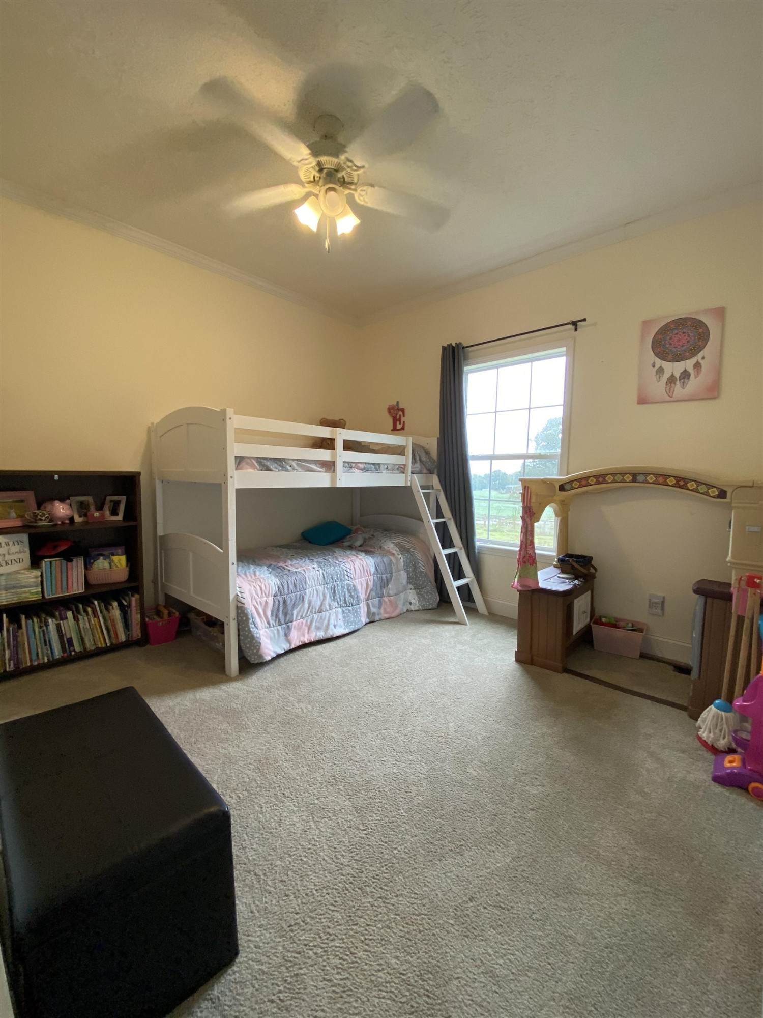 3070 Westport Road Huntingdon, TN 38344 - Photo 13 of 23 a living room with furniture and a chandelier