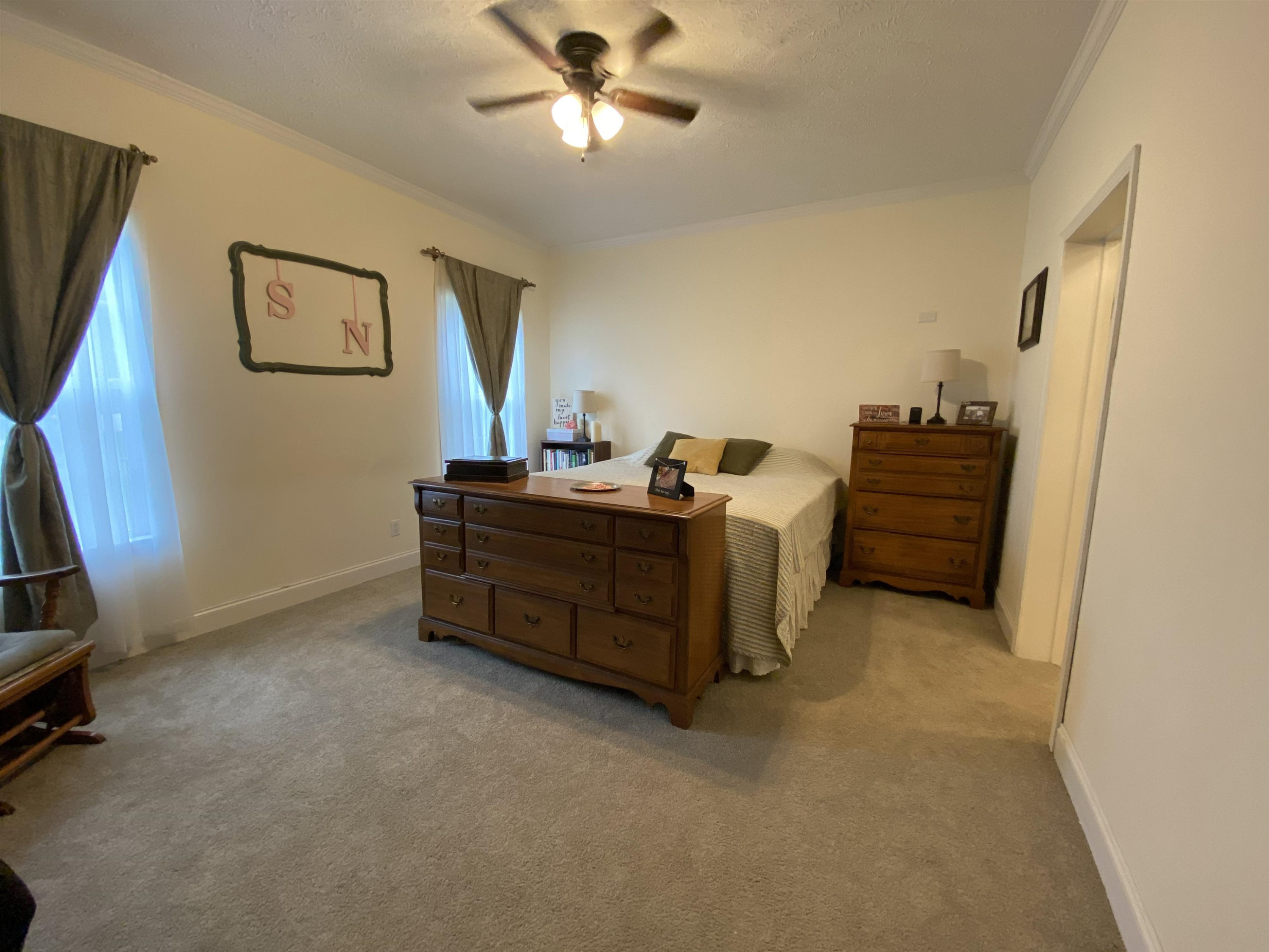3070 Westport Road Huntingdon, TN 38344 - Photo 16 of 23 a bed room with a bed and a television