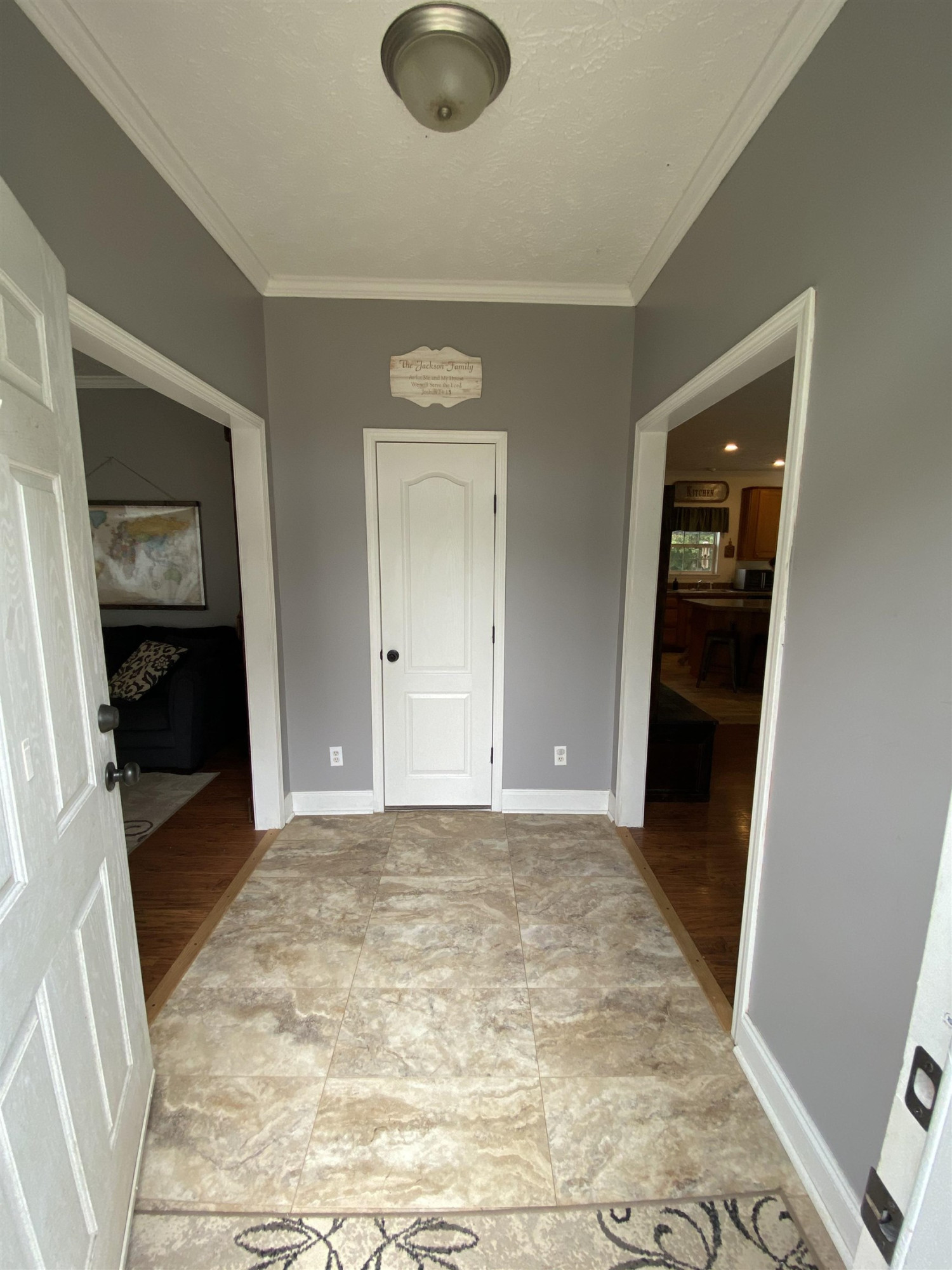 3070 Westport Road Huntingdon, TN 38344 - Photo 2 of 23 an empty room with wooden floor and bathroom