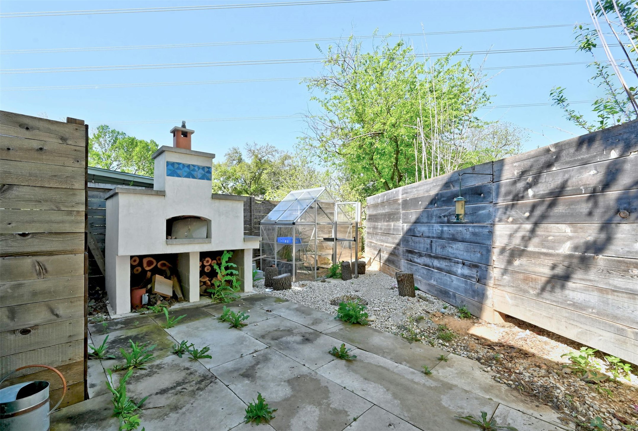 4804 Menchaca Road Austin, TX 78745 - Photo 35 of 38 Garage Apartment Courtyard w/ Outdoor Oven