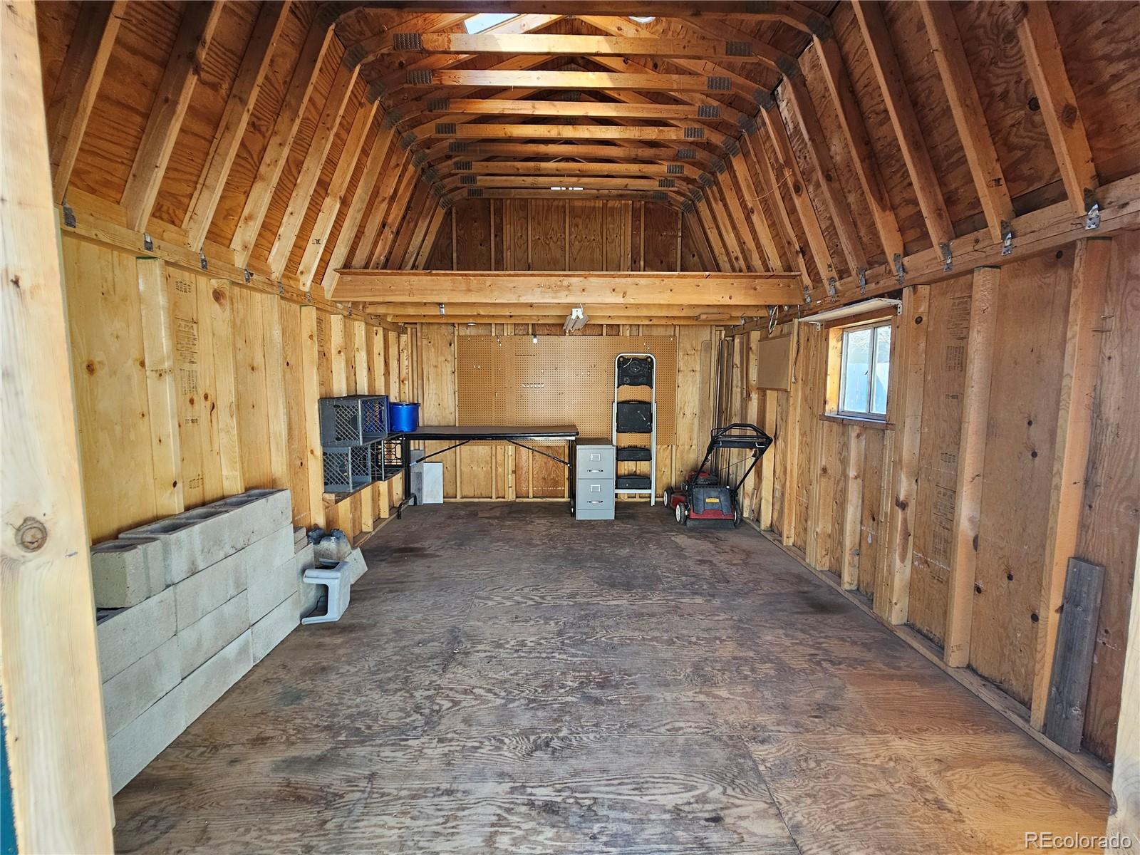 1723 Ascot Road Colorado Springs, CO 80906 - Photo 26 of 29 a view of a porch with furniture and shower