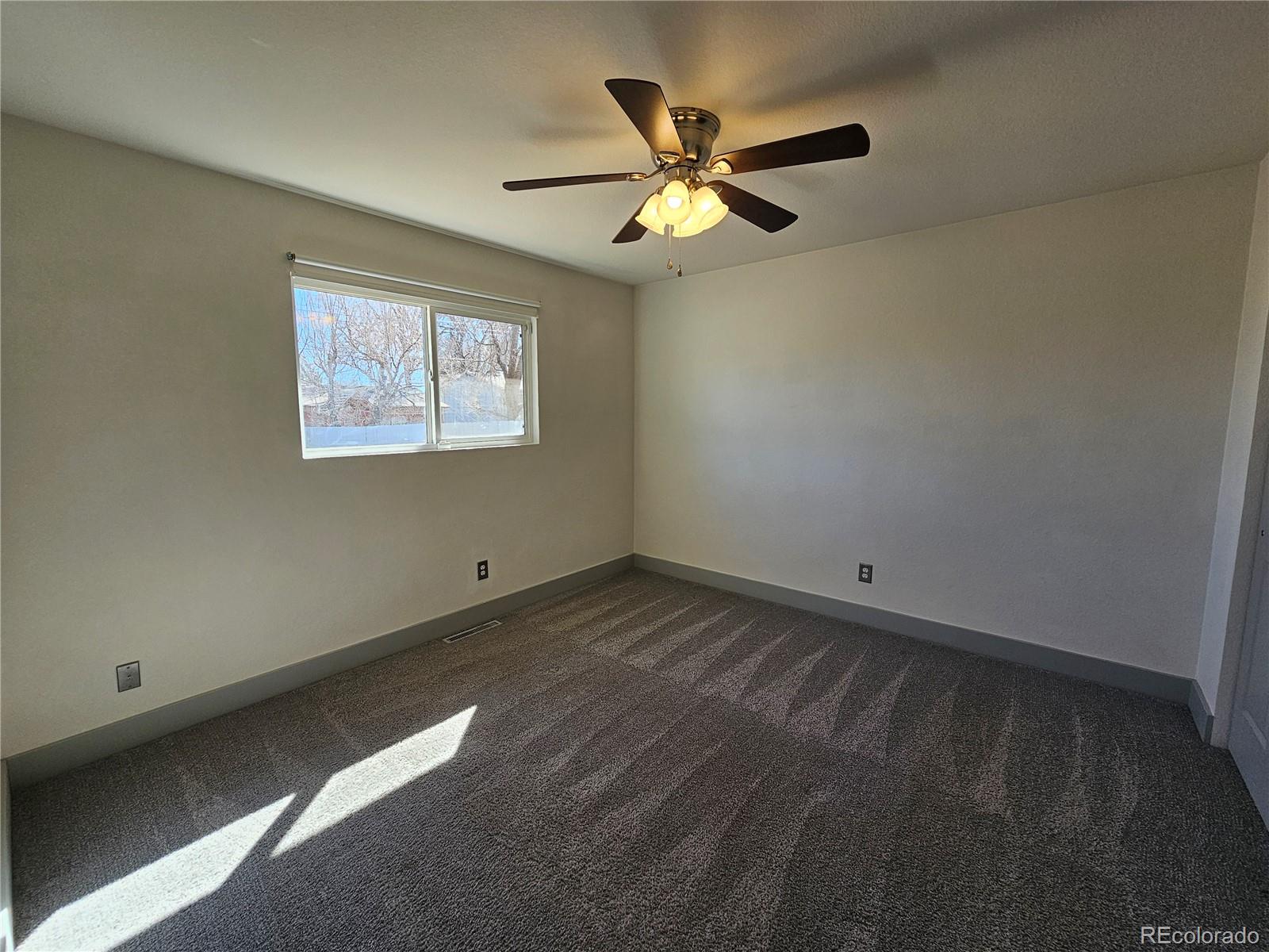 1723 Ascot Road Colorado Springs, CO 80906 - Photo 10 of 29 a view of an empty room