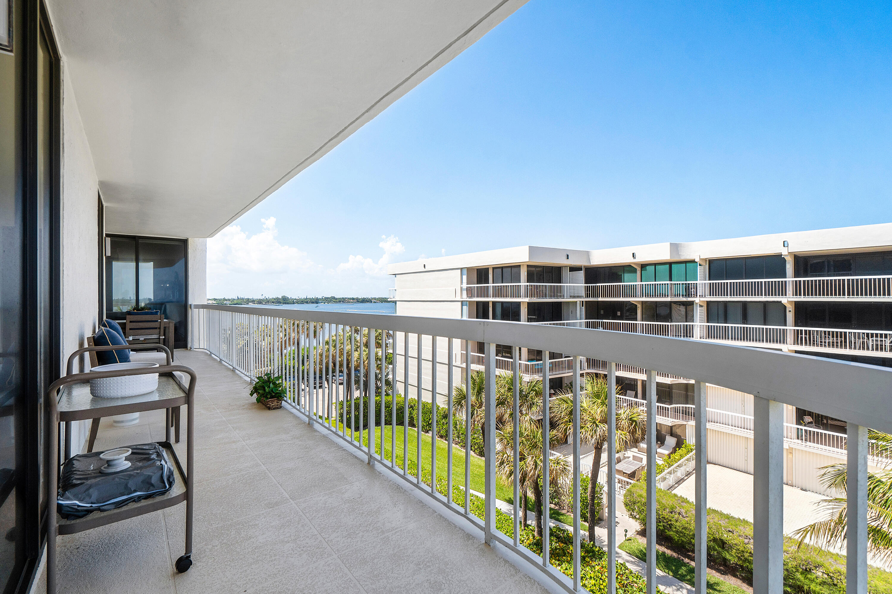 3300 South Ocean Boulevard, Unit 405 Palm Beach, FL 33480 - Photo 12 of 23 a view of a balcony with chairs