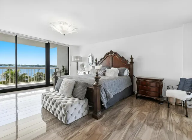 a bed room with a bed and a couch