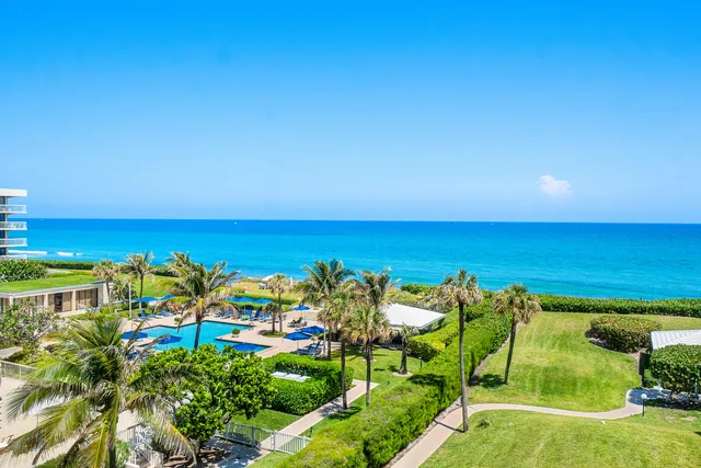 a view of a lake with a building in the background