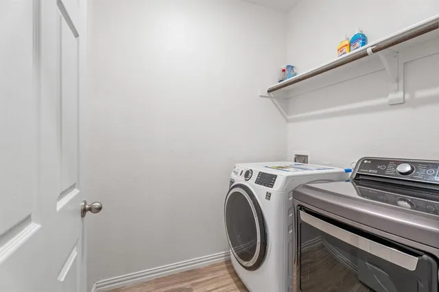 a utility room with dryer and washer