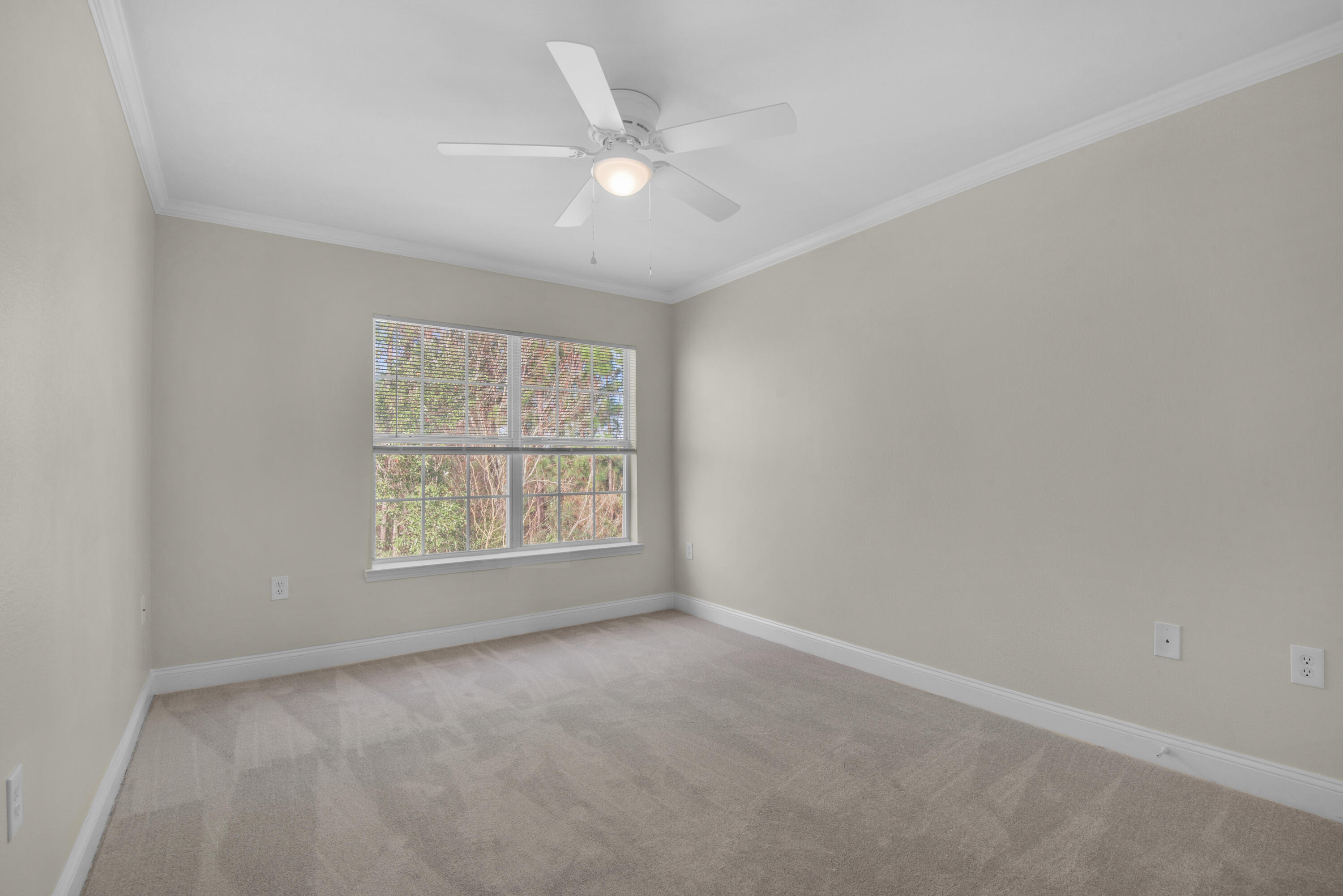 537 Wingspan Way Crestview, FL 32536 - Photo 20 of 34 an empty room with a window