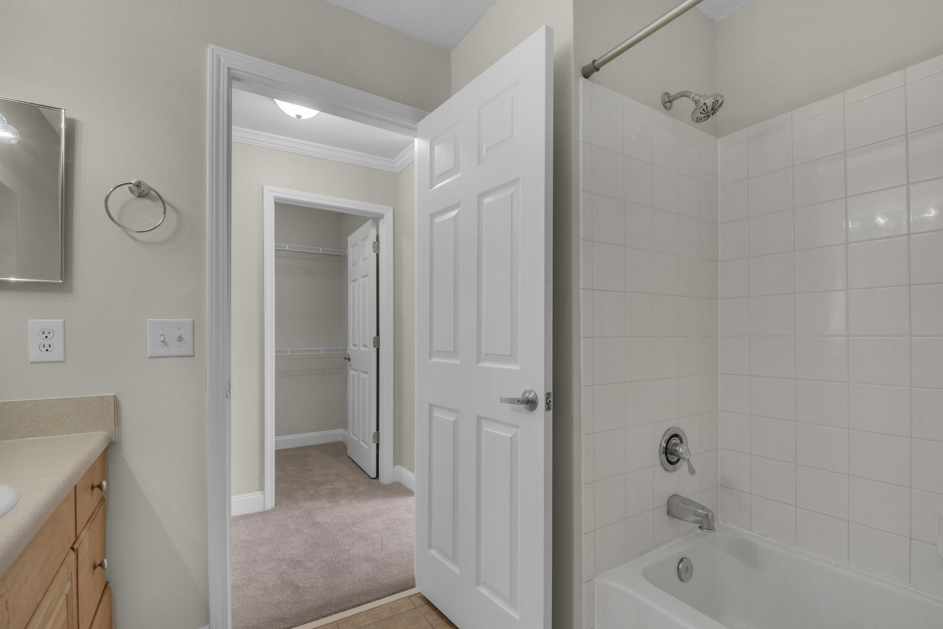 537 Wingspan Way Crestview, FL 32536 - Photo 22 of 34 a bathroom with a bathtub and shower