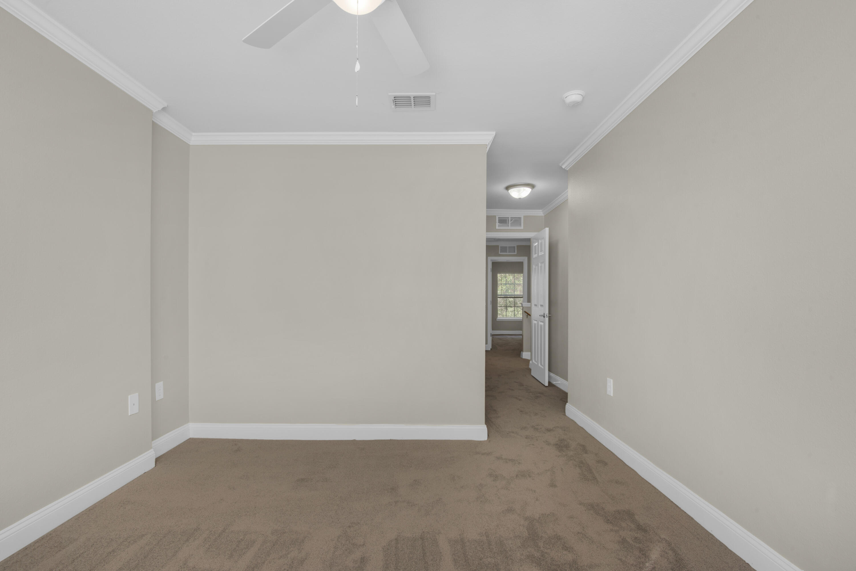 537 Wingspan Way Crestview, FL 32536 - Photo 24 of 34 an empty room with an entryway