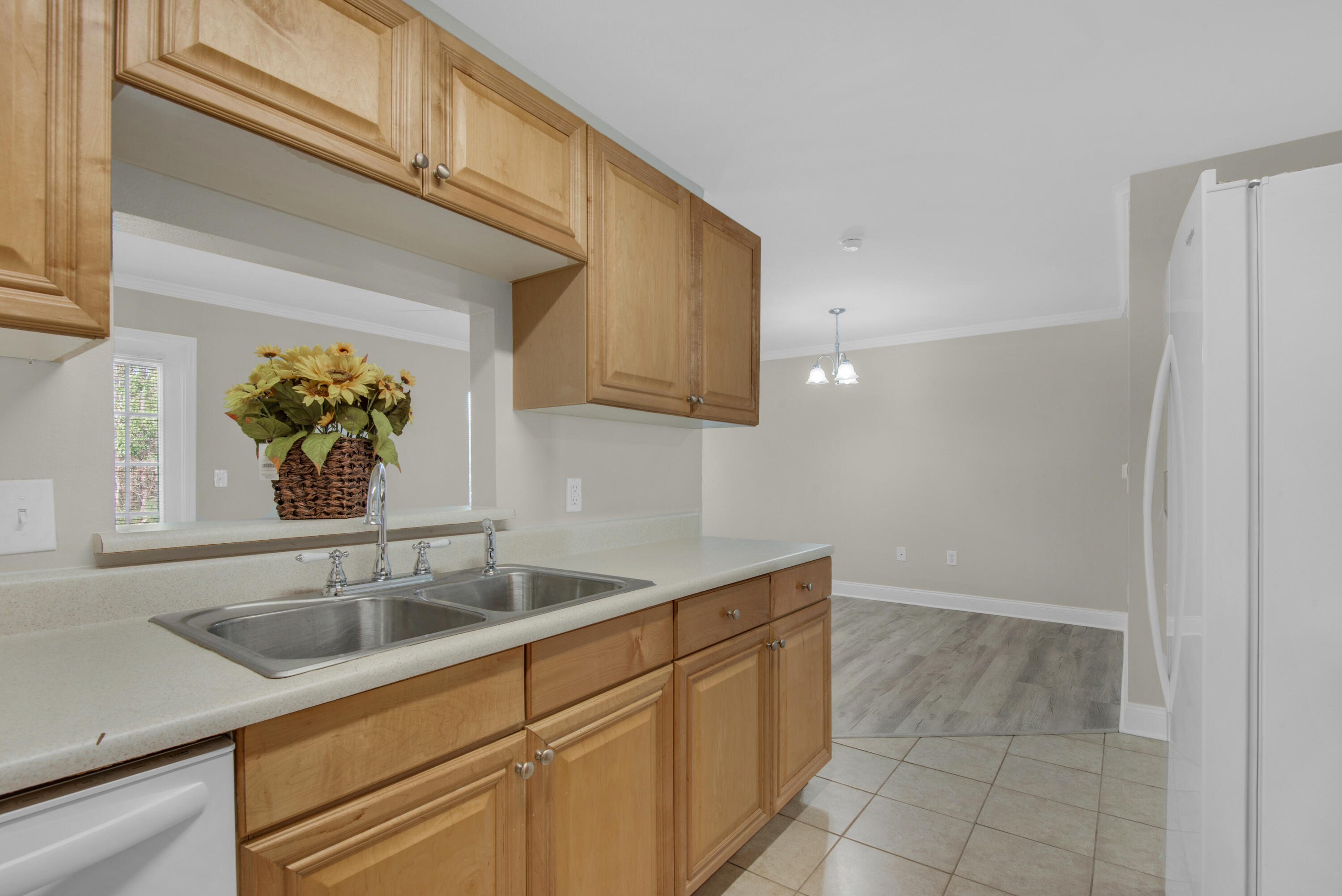 537 Wingspan Way Crestview, FL 32536 - Photo 8 of 34 a kitchen with a sink and cabinets
