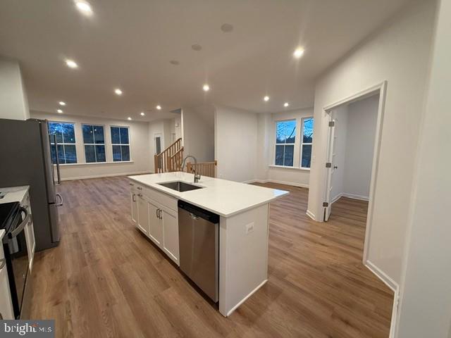 10102 Queens Way Manassas, VA 20110 - Photo 5 of 16 a kitchen with a stove and a refrigerator