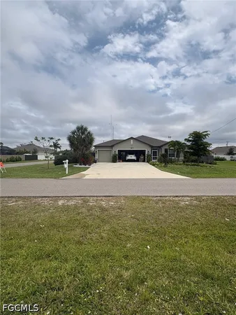 a view of a swimming pool and a yard