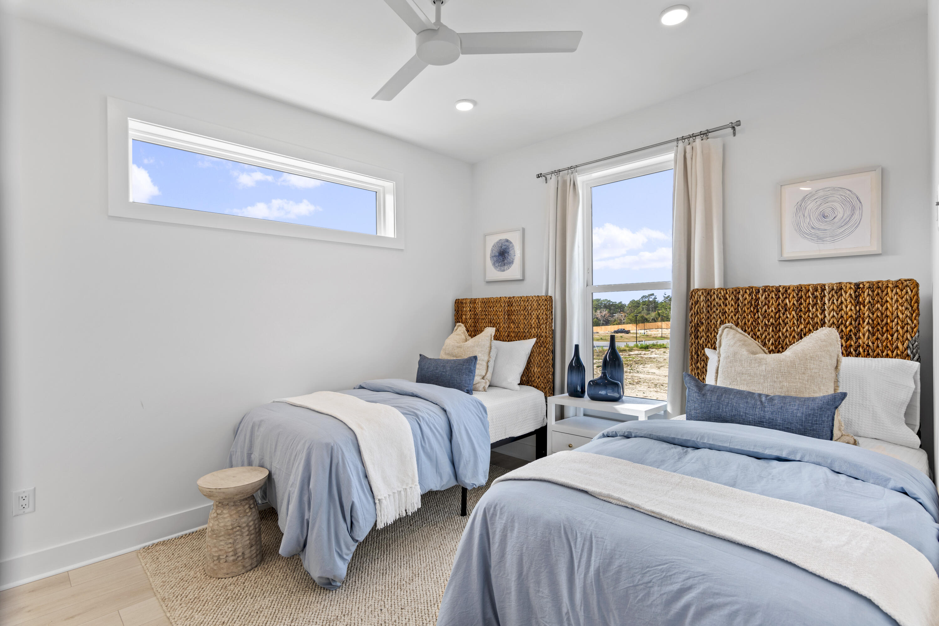 58 Sarah St Inlet Beach, Unit LOT 25 Inlet Beach, FL 32461 - Photo 14 of 31 a bedroom with two beds and a couch