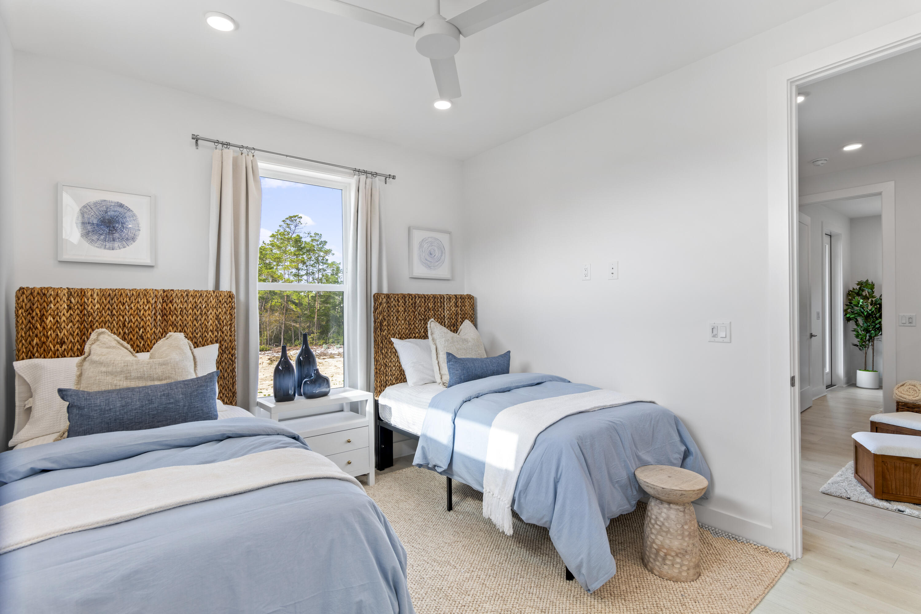 58 Sarah St Inlet Beach, Unit LOT 25 Inlet Beach, FL 32461 - Photo 15 of 31 a bedroom with a bed and a window