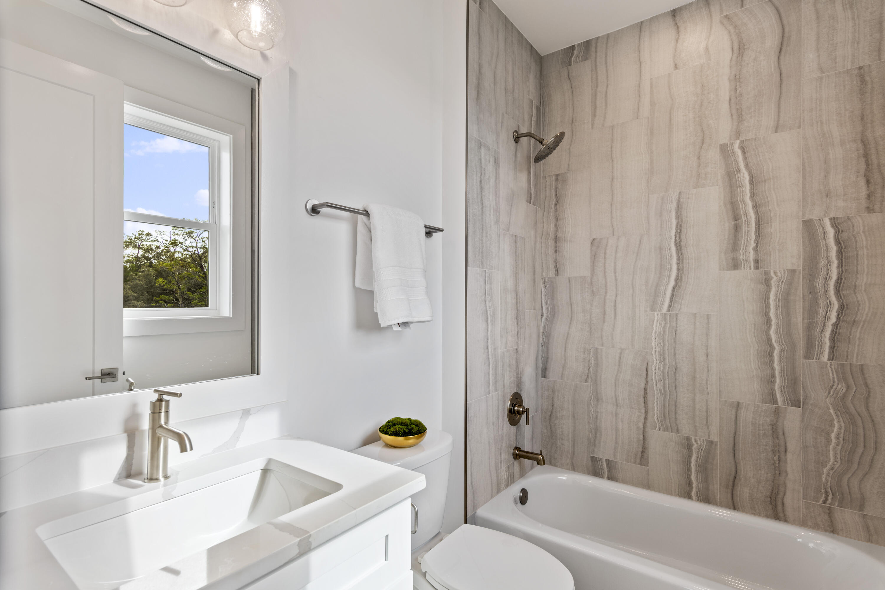 58 Sarah St Inlet Beach, Unit LOT 25 Inlet Beach, FL 32461 - Photo 16 of 31 a bathroom with a sink toilet and shower