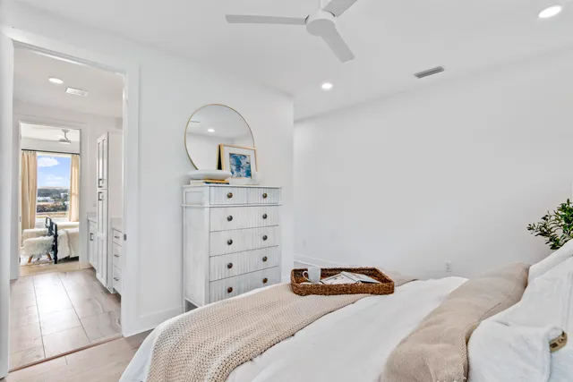 a bedroom with a bed and a view of bathroom