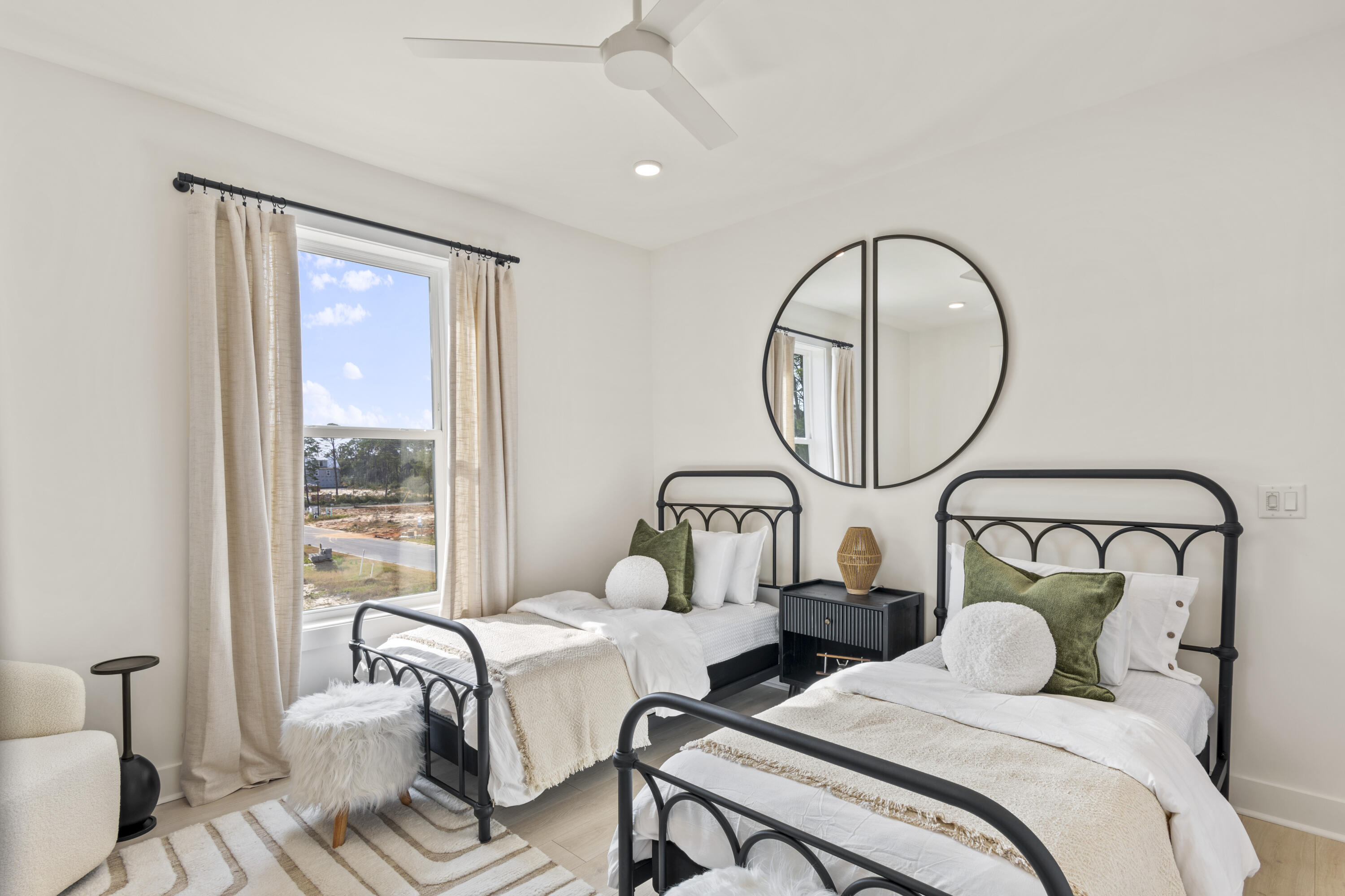 58 Sarah St Inlet Beach, Unit LOT 25 Inlet Beach, FL 32461 - Photo 20 of 31 a bedroom with two beds and a large window