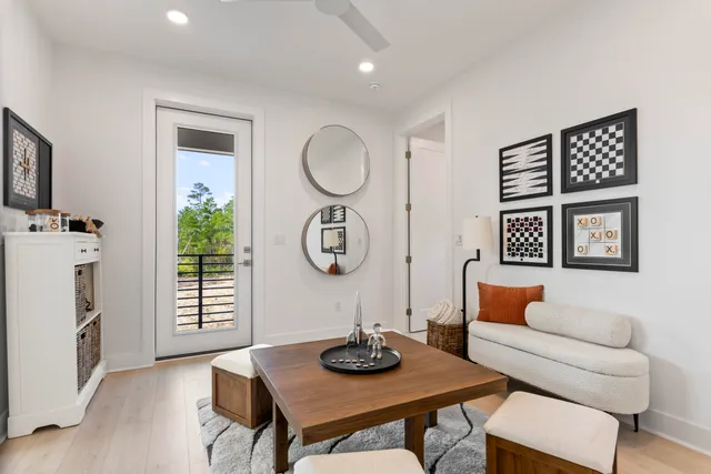 a view of a livingroom with furniture and wooden floor