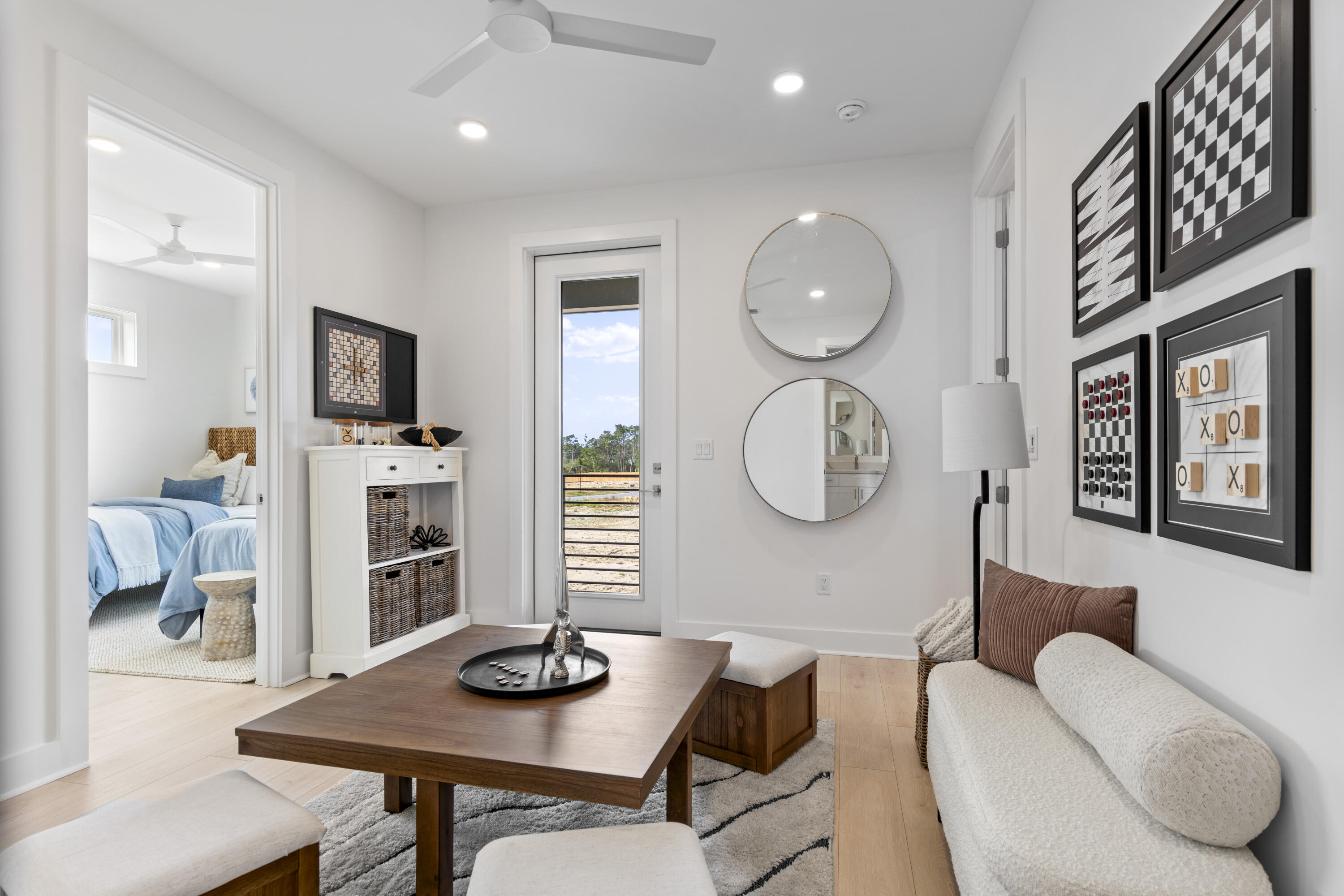 58 Sarah St Inlet Beach, Unit LOT 25 Inlet Beach, FL 32461 - Photo 10 of 31 a view of a livingroom with furniture and window