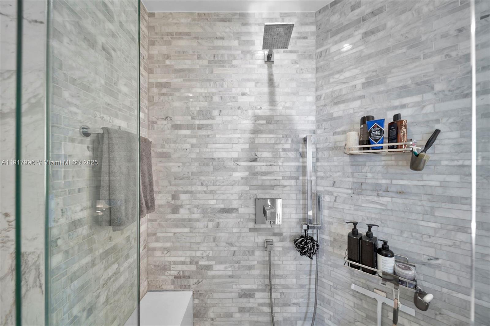 851 Northeast 1st Avenue, Unit 2203 Miami, FL 33132 - Photo 48 of 53 a bathroom with a shower