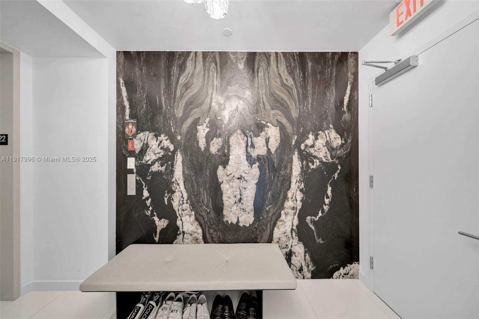 851 Northeast 1st Avenue, Unit 2203 Miami, FL 33132 - Photo 6 of 53 a view of kitchen with a table and a fireplace