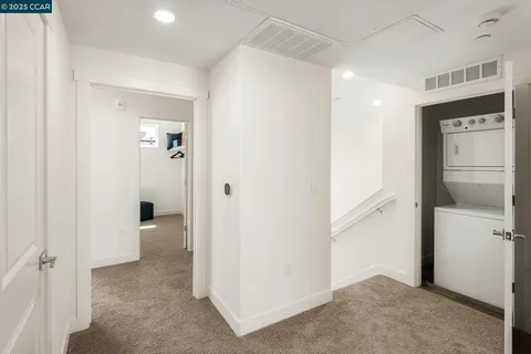 a view of a hallway with an empty room