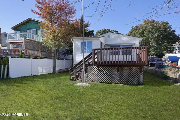 front view of a house with a garden