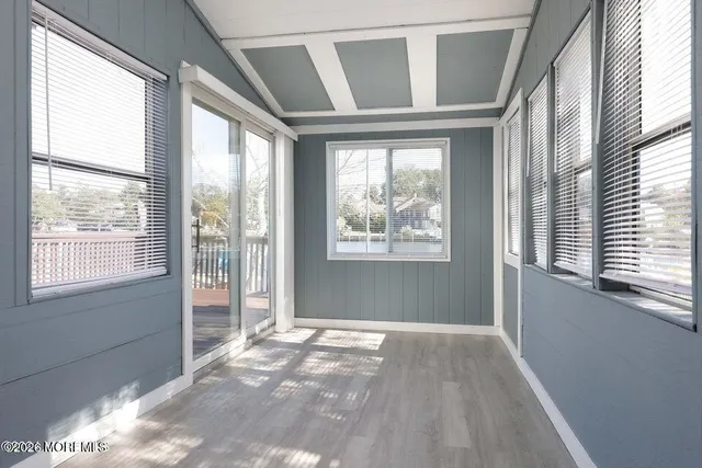 a view of hallway with windows
