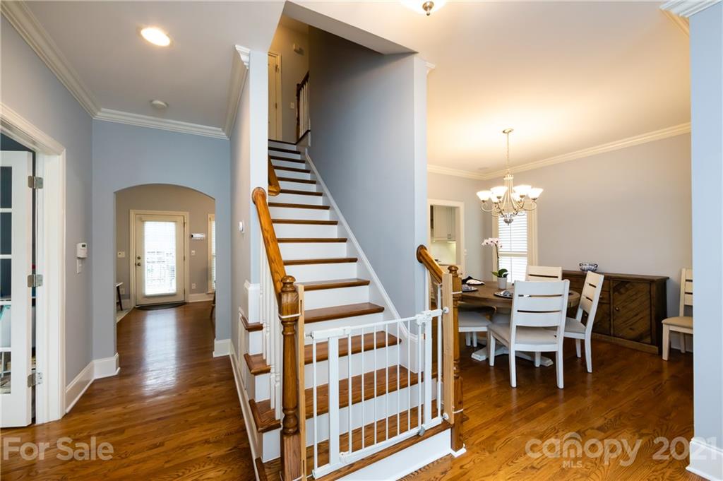 817 Millbrook Road Charlotte, NC 28211 - Photo 3 of 26 a view of a livingroom with furniture and wooden floor