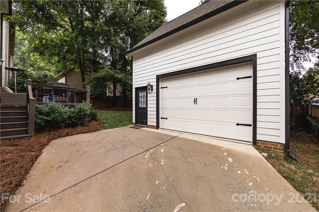 817 Millbrook Road Charlotte, NC 28211 - Photo 21 of 26 a front view of a house with garage