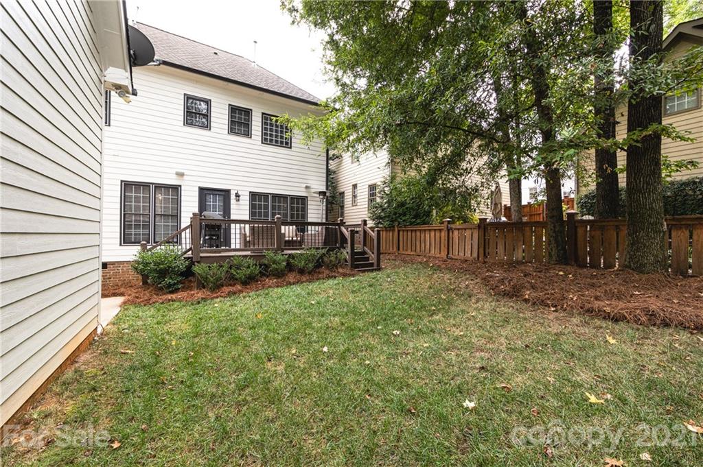 817 Millbrook Road Charlotte, NC 28211 - Photo 25 of 26 a view of a house with backyard and sitting area