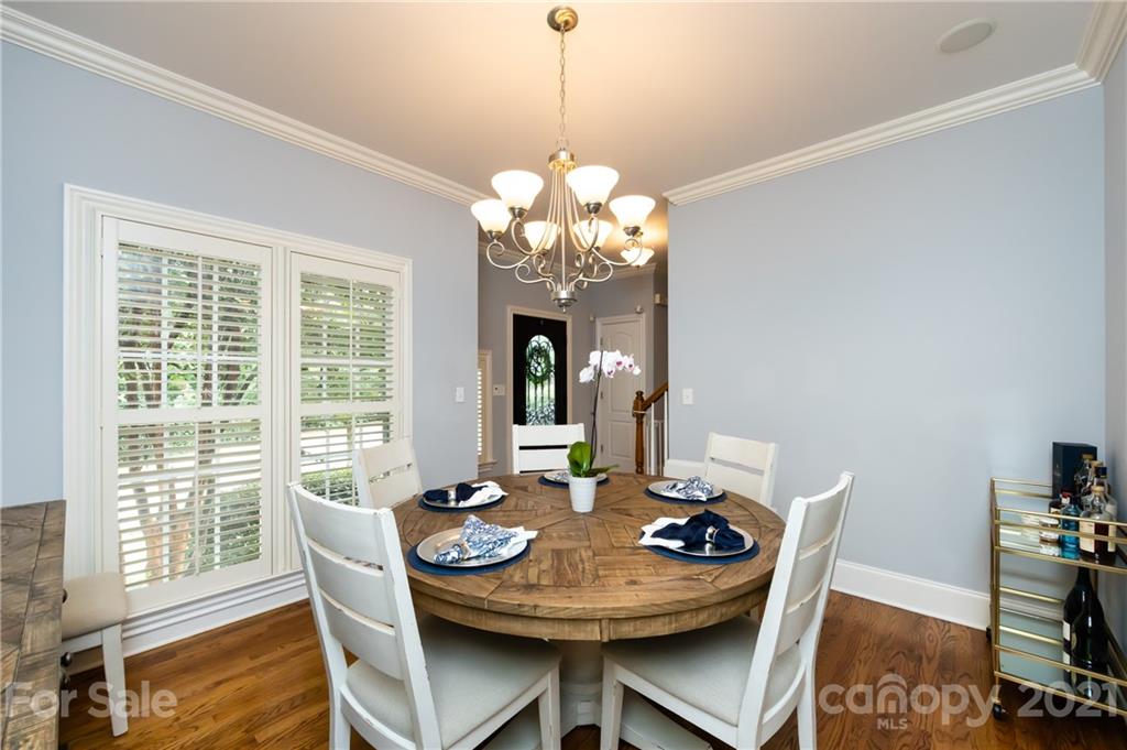 817 Millbrook Road Charlotte, NC 28211 - Photo 5 of 26 a view of a dining room with furniture window and outside view