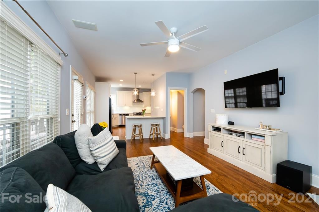 817 Millbrook Road Charlotte, NC 28211 - Photo 6 of 26 a living room with furniture and a flat screen tv