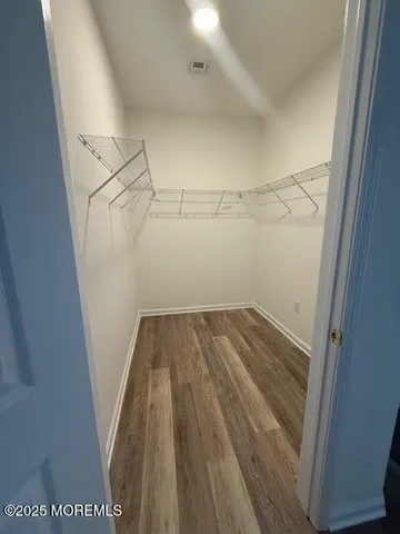 a view of a room with racks on the wall