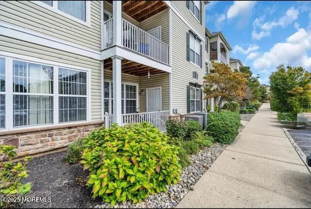 a house view with a garden space