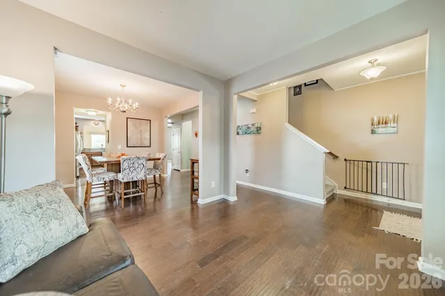 a spacious bedroom with a bed and a couch