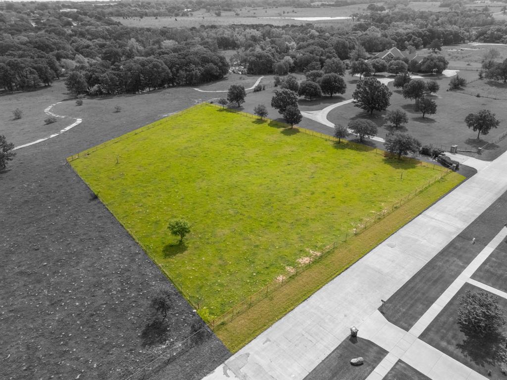 Tbd Sleepy Hollow Road Ennis, TX 75119 - Photo 6 of 11 Expansive green lot featuring a single tree and partial fencing