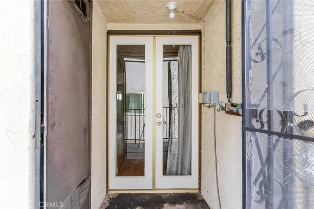 a view of a bathroom from a hallway
