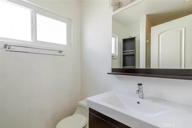 a bathroom with a sink and a toilet