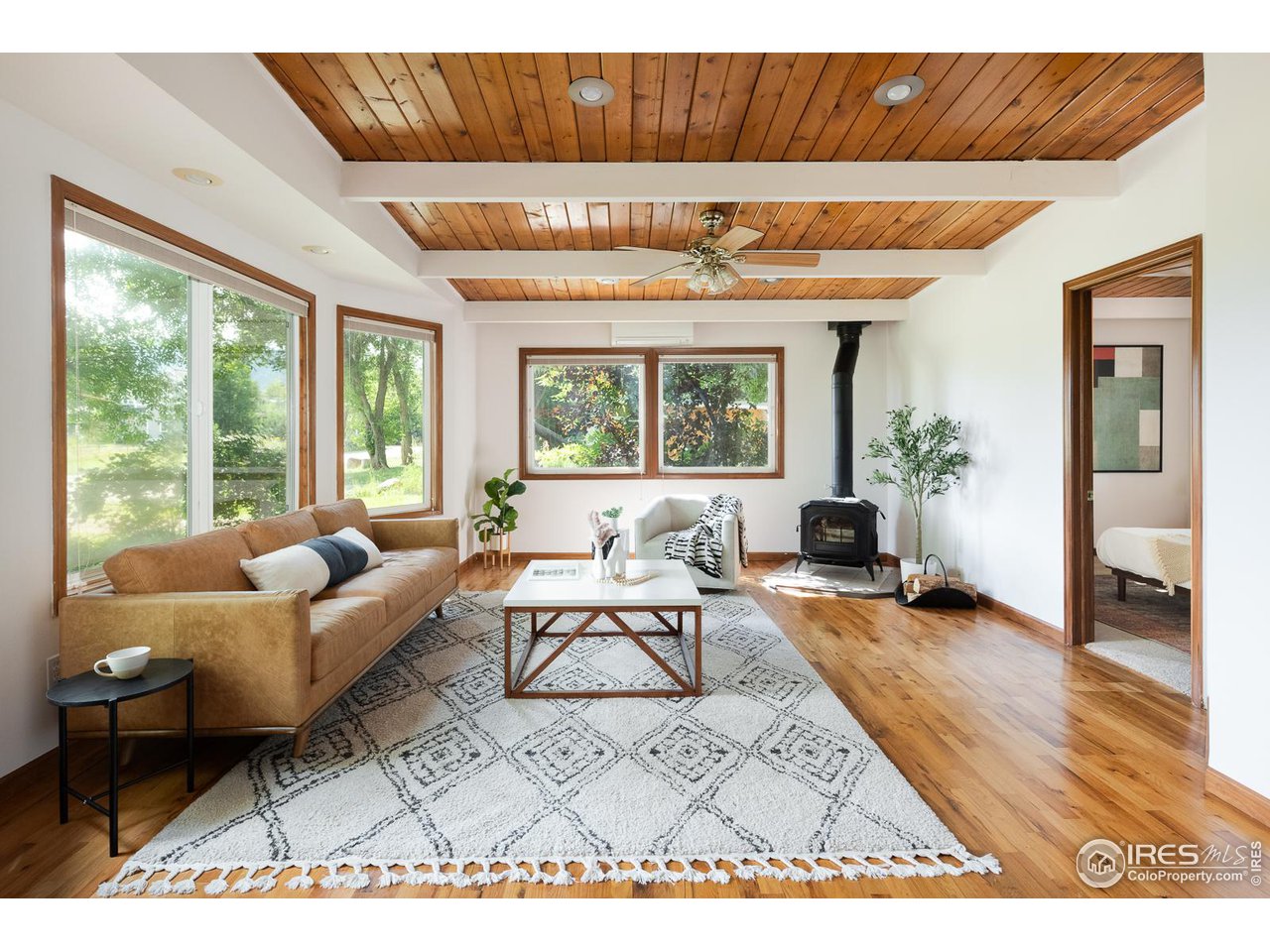 1675 Upland Avenue Boulder, CO 80304 - Photo 11 of 39 Living room with fireplace