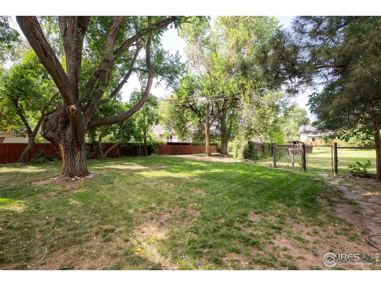 1675 Upland Avenue Boulder, CO 80304 - Photo 36 of 39 Section of fenced backyard