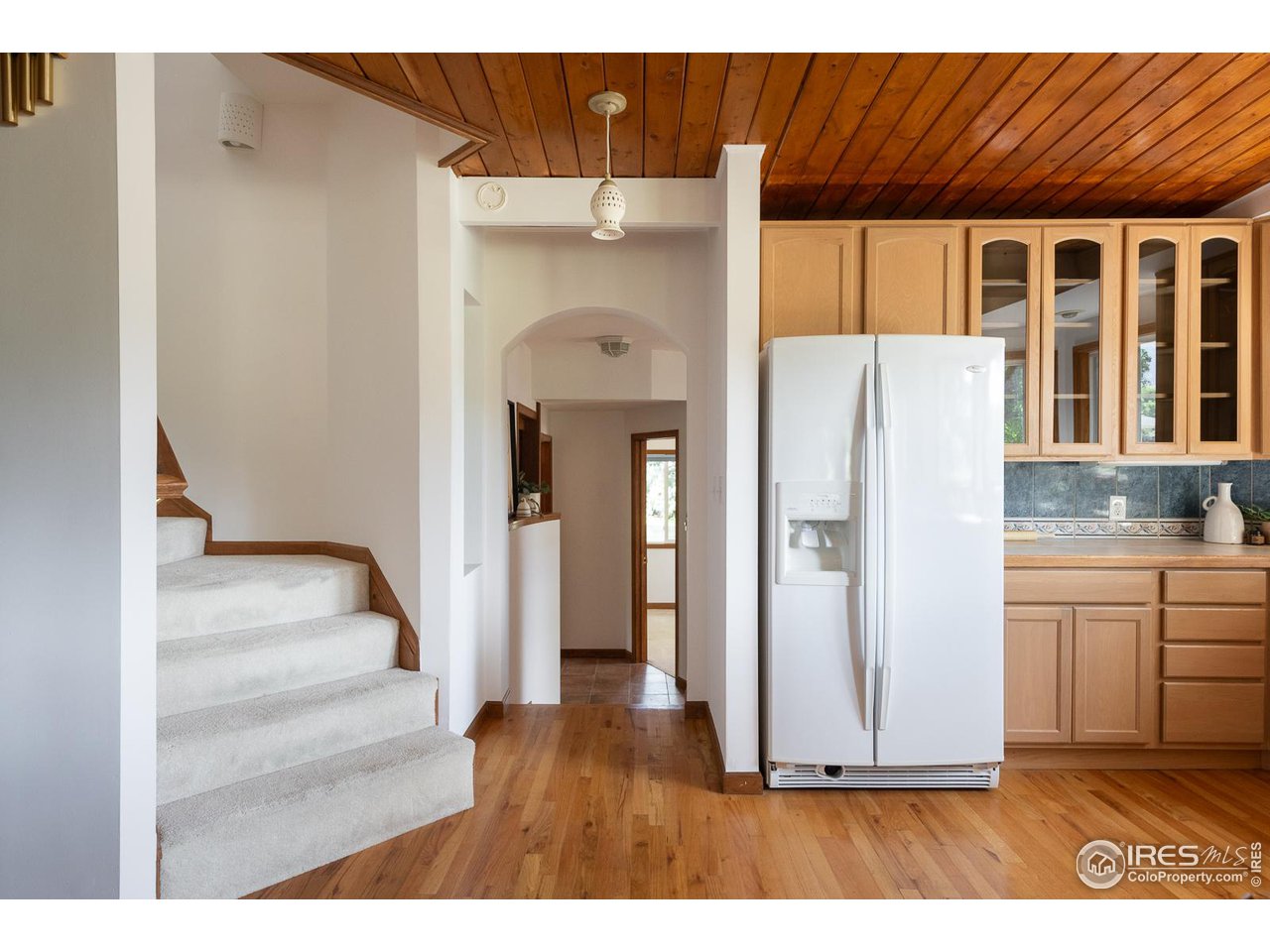 1675 Upland Avenue Boulder, CO 80304 - Photo 6 of 39 Kitchen and stairs to upper level