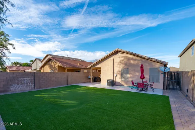 a view of a backyard with a garden